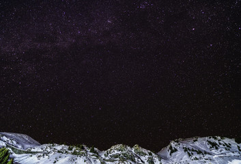 Fototapeta na wymiar Sky night with stars in the mountains during the winter