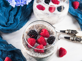 Chia pudding with fresh berries in glass for breakfast