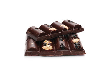 chocolate bars with blueberries, almonds and hazelnuts isolated on white background