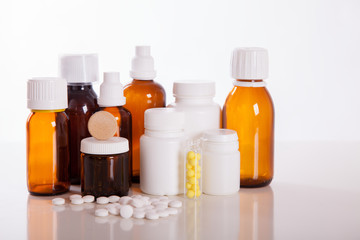 Medical pills and hot tea with lemon, treatment of colds, flu and runny.