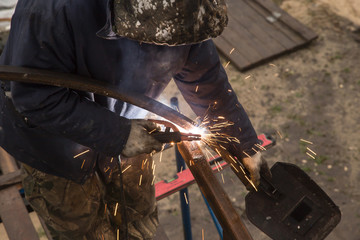 Sparks from welding at the construction site
