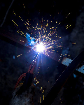 Sparks from welding at the construction site