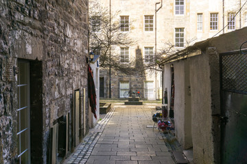 Fototapeta premium EDINBURGH, SCOTLAND - March 27, 2017: Street view of Historic Old Town Houses in Edinburgh, Scotland