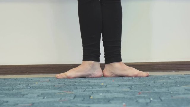 Balerita girl walks on toes