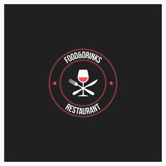food and drinks logo. wine glass with fork and knife on black background