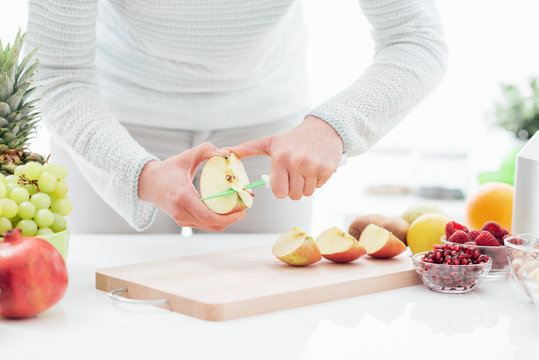 Woman Cutting Apples