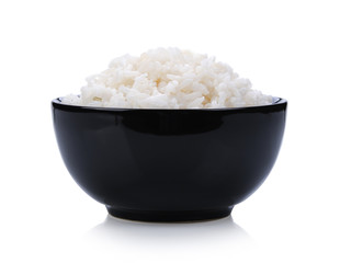 rice in black bowl on white background