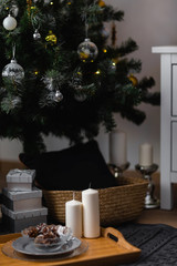  A cozy corner, gifts under the Christmas tree, decorations for Christmas, Christmas spruce. New Year.
