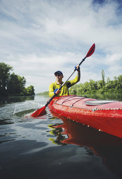 Kayak Water Sports Banner with Copy Space. Senior Kayaker on the Scenic Lake Panoramic Photo.