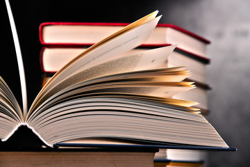 Composition with open book on the table