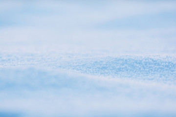 Blue white snowy blurred background