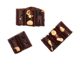 Chocolate bars with blueberries, almonds and hazelnuts isolated on white background, top view