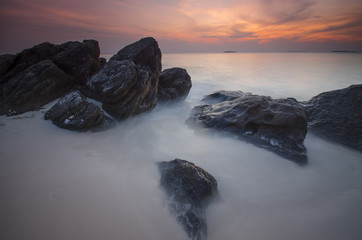 Fototapeta na wymiar Sunset at Ujung gelam beach, karimun jawa island, central java, indonesia