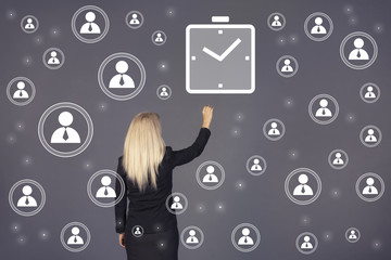 Businessman presses button clock time on virtual electronic user interface