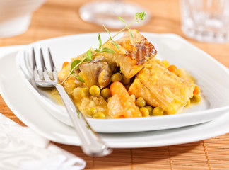 Plate of fried fish with sauce