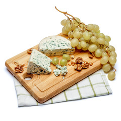 blue cheese on wooden cutting board