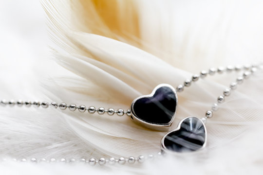 Heart Shape Black Diamond Necklace On Feather.