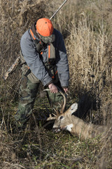 Deer Hunter in Iowa with a trophy Whitetail Buck