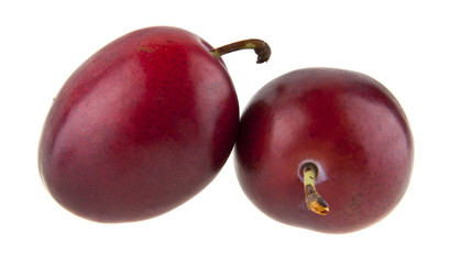 plums isolated on white background