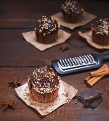 chocolate muffin sprinkled with nuts