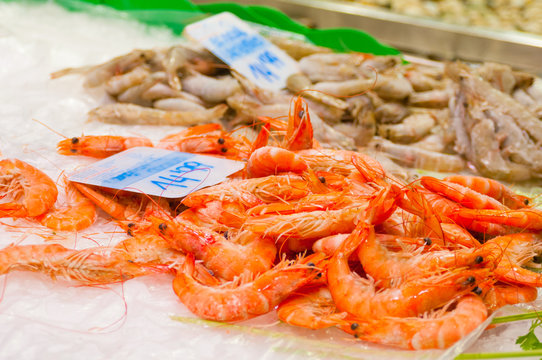 Fresh shrimps closeup at market stall