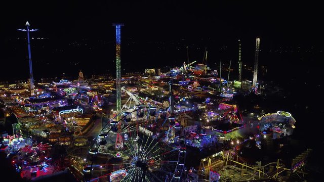 Night Time fairground from drone in 4k