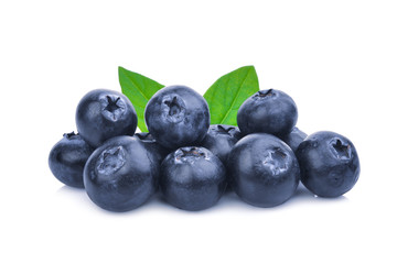 blueberries with green leaves isolated on white background