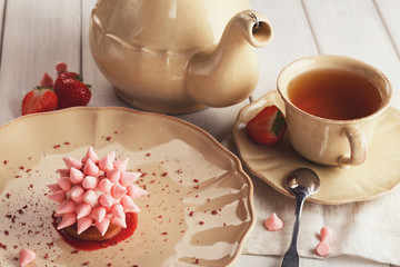 Pink restaurant dessert on porcelain plate