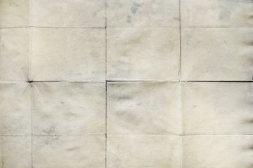 Old crumpled sheet of paper, texture background