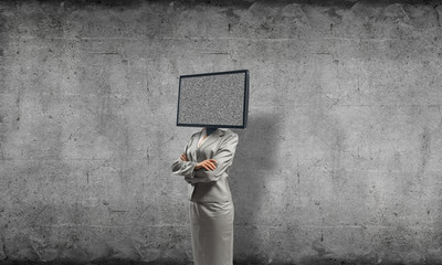 Business woman with TV instead of head.