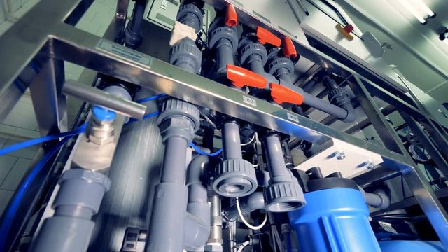 Many plastic tubes for water filtering system.