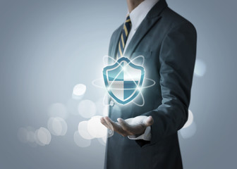 Cyber security, internet security or information protection service concept. Businessman is holding...