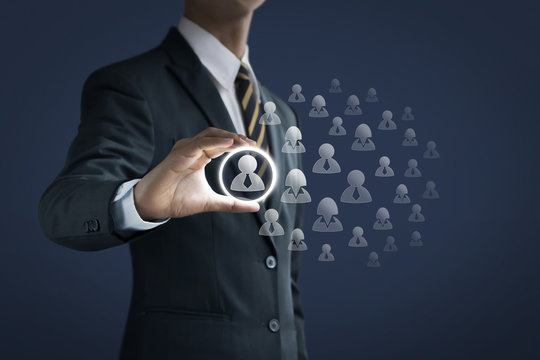 HR, human resources management, recruitment, employment or finding leader concept. Businessman is holding an officer icon