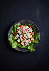 Tasty meal with fresh and healthy prawn salad and vegetables.
