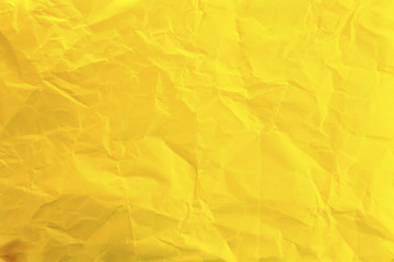 Fototapety    Crumpled yellow paper as background
