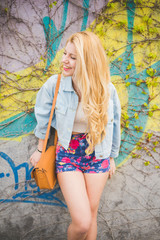 Naklejka premium Young handsome blonde girl posing