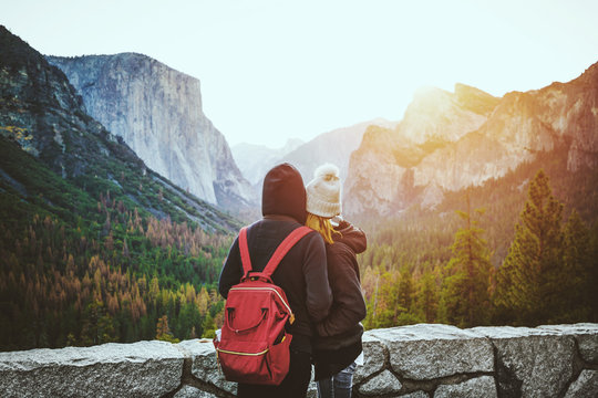 Loving couple enjoying famous Tunnel View in Yosemite National Park, California USA