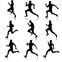 Set of silhouettes. Runners on sprint, men