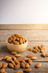 Full of Almonds in wooden brown bowl