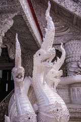 Beautiful molding art at Ming Muang temple in Nan province