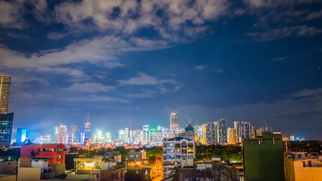 Time lapse view of Makati skyscrapers in Manila city. Skyline at night, Philippines.