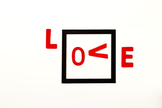 Word character and black square on the white background.Conceptual of valentine day.