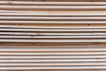 timber boards stacked ready for use by carpenter