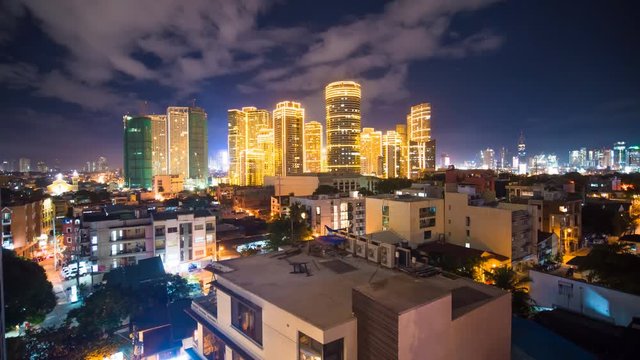 Time lapse view of Makati skyscrapers in Manila city. Skyline at night, Philippines.