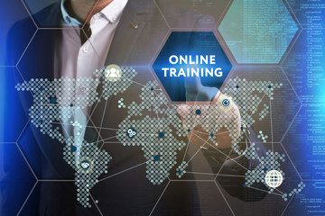 Business, Technology, Internet and network concept. Young businessman working on a virtual screen of the future and sees the inscription: Online training