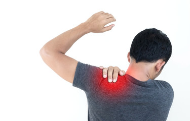 Young man feeling exhausted and suffering from shoulder pain, Health concept.