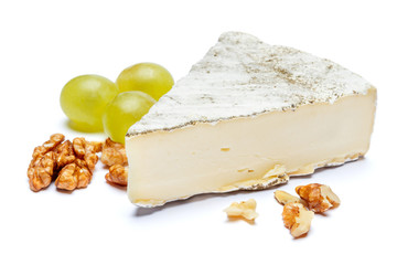 traditional french brie cheese on a white background
