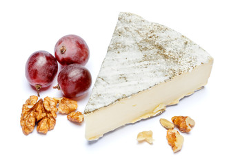 traditional french brie cheese on a white background