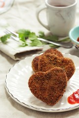 Homemade Heart cutlets for Valentines day, selective focus