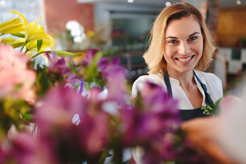 Happy florist -  Successful small business owner